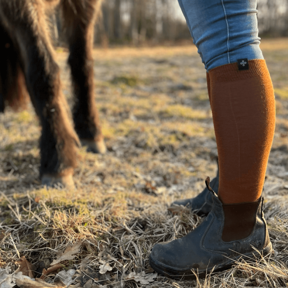 Ridstrumpa Allround Jordbrun 75 % Merinowolle